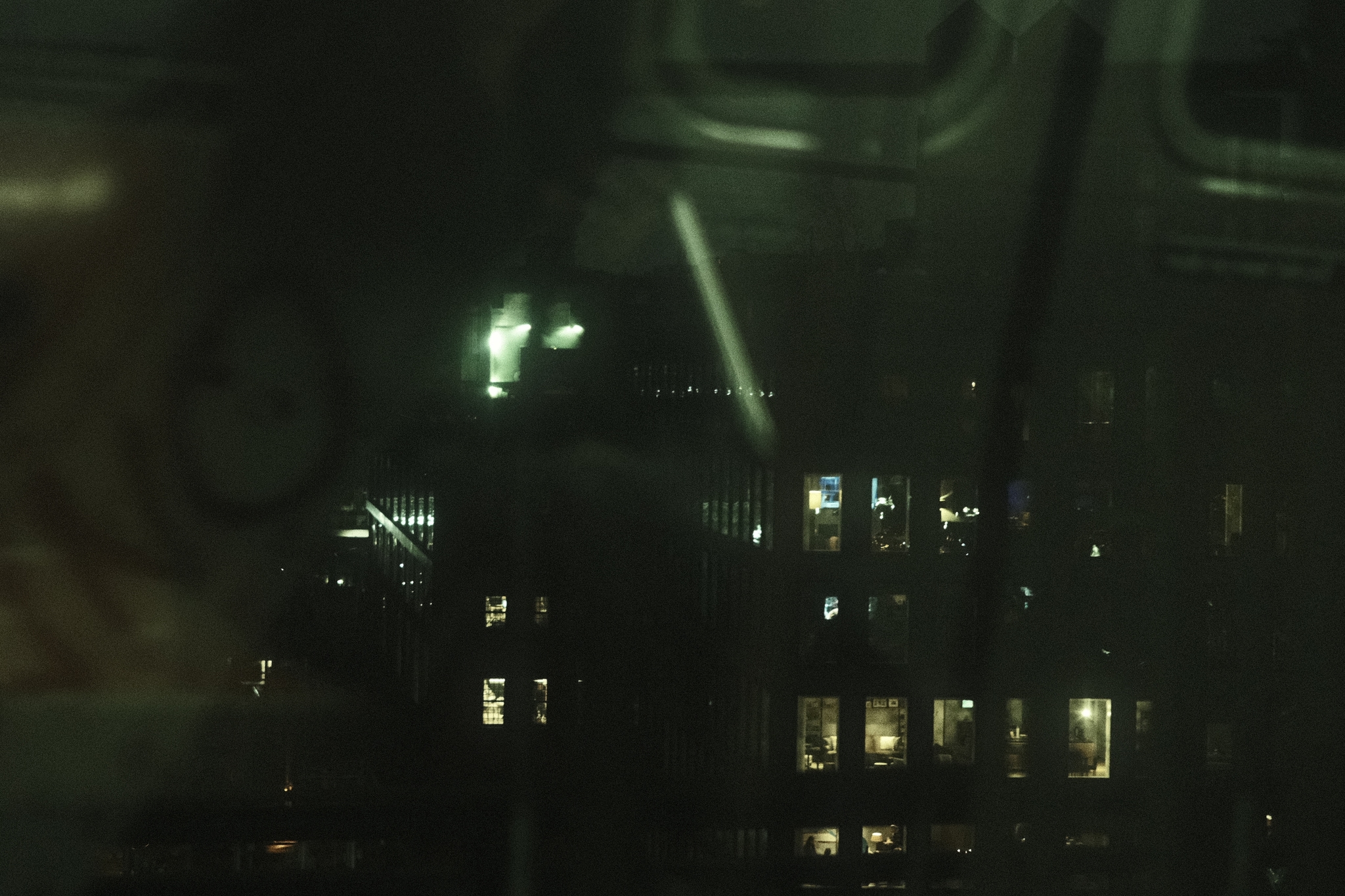BEHIND THE WINDOWS