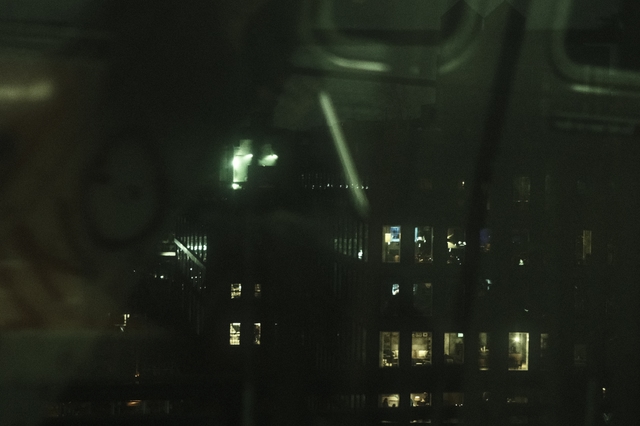 BEHIND THE WINDOWS